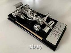 Signed Limited Edition of 130 pieces Nigel Mansell Signed Ferrari 640 1/18 Model